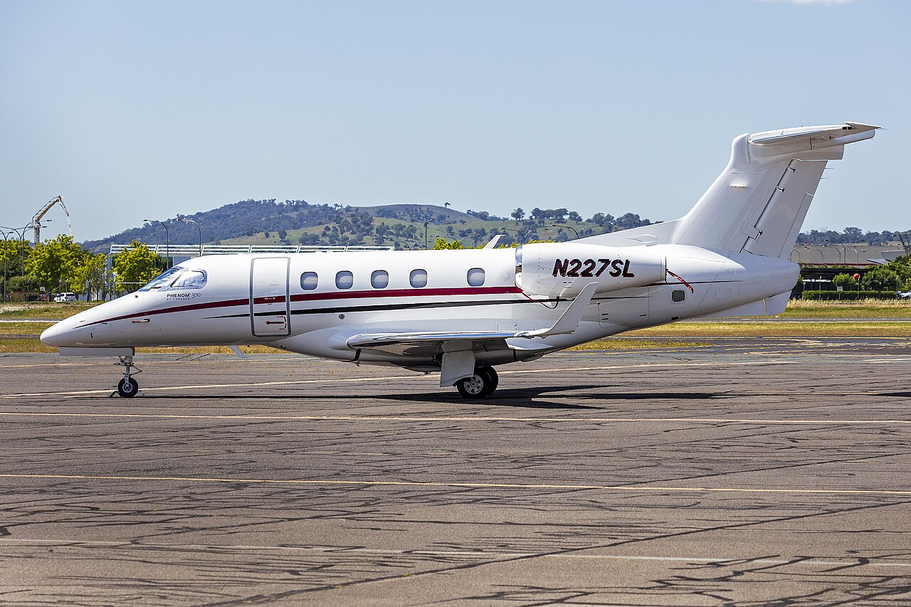 Embraer Phenom 300 light jet at an airport