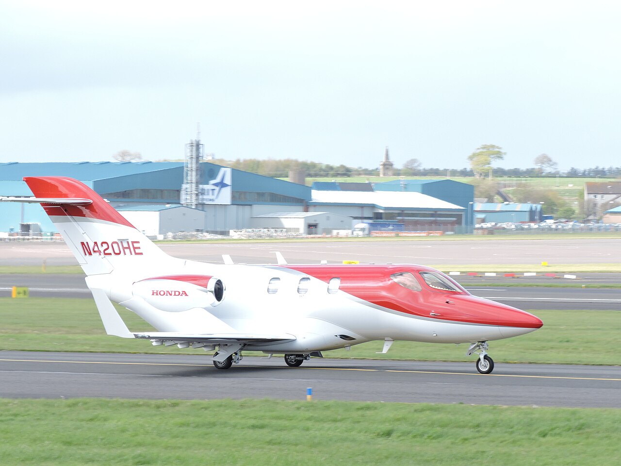 HondaJet very light jet parked on an airport apron